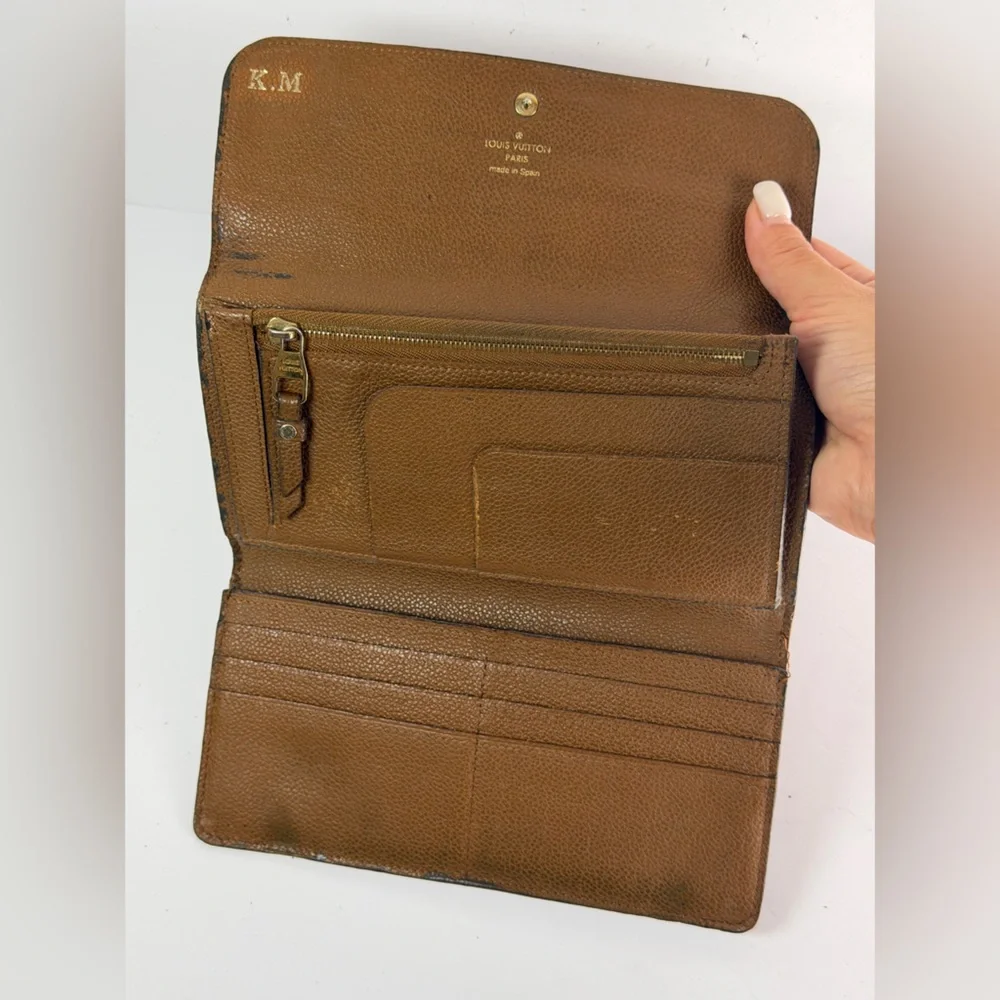 Louis Vuitton Virtuose Wallet Crafted Brown Monogram Empreinte Leather